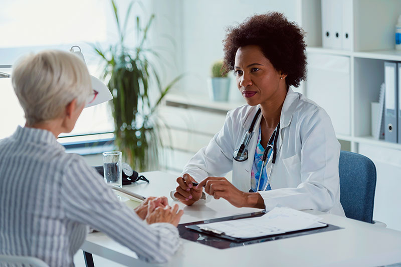 female physician with a patient